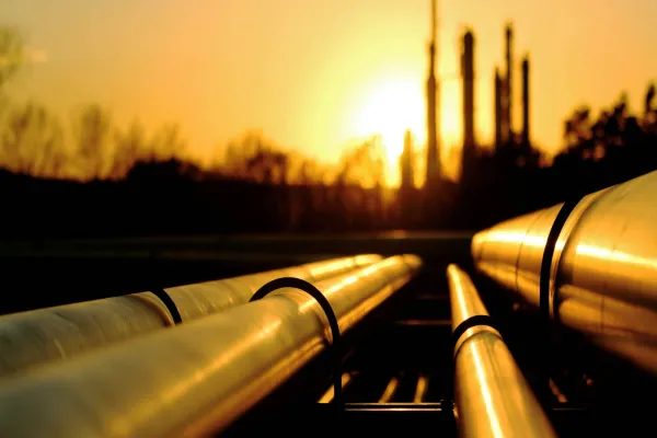 Golden pipes going to oil refinery