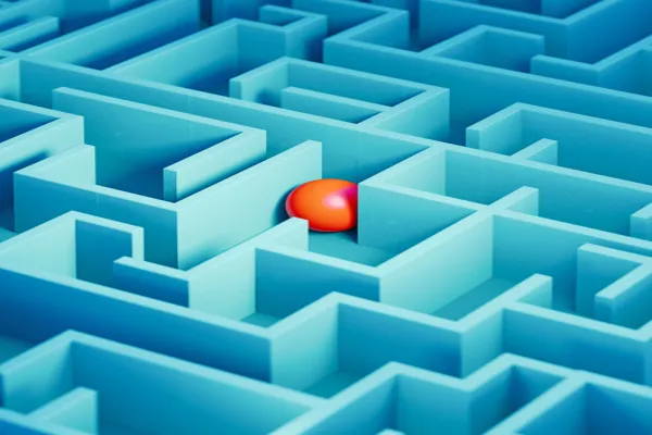 Red Colored Sphere Trapped Inside A Blue Maze - Solution Concept