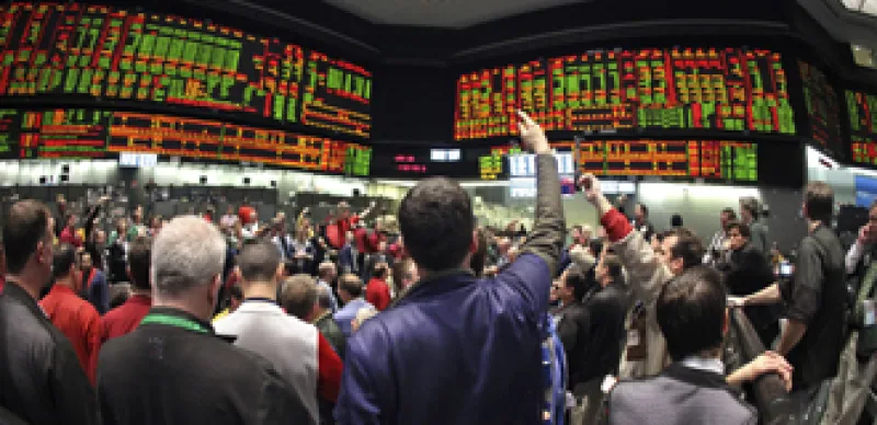 Traders Work At The Chicago Board Of Trade