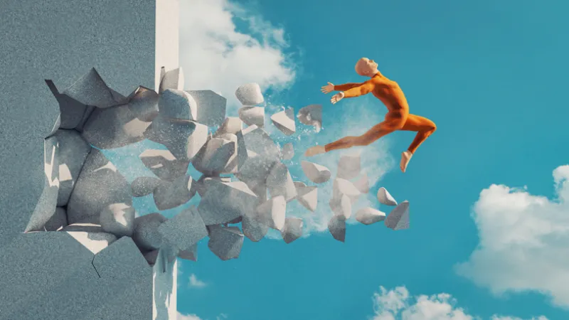 Man breaking through wall