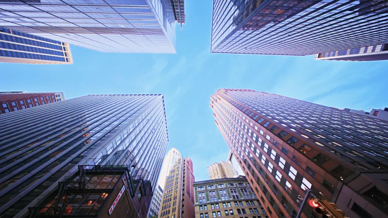 corporate skyscrapers frame the sky in Midtown Manhattan, New York City, USA