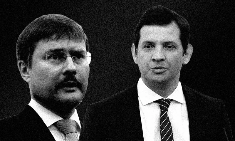 Sergey Ivanov, CEO of Alrosa PJSC and Adrian Tanase, CEO of Bucharest Stock Exchange. (Andrey Rudakov/Bloomberg; Courtesy BVB)