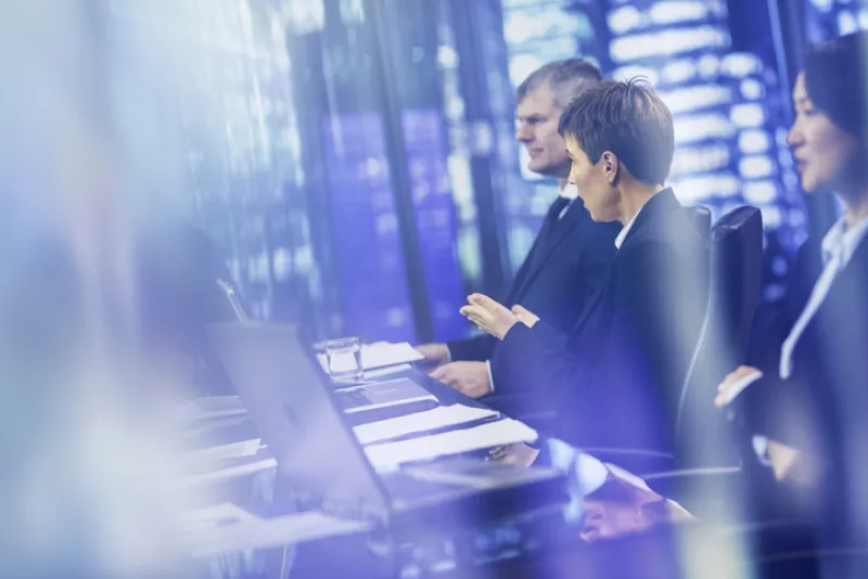 Businesswoman asking questions during meeting