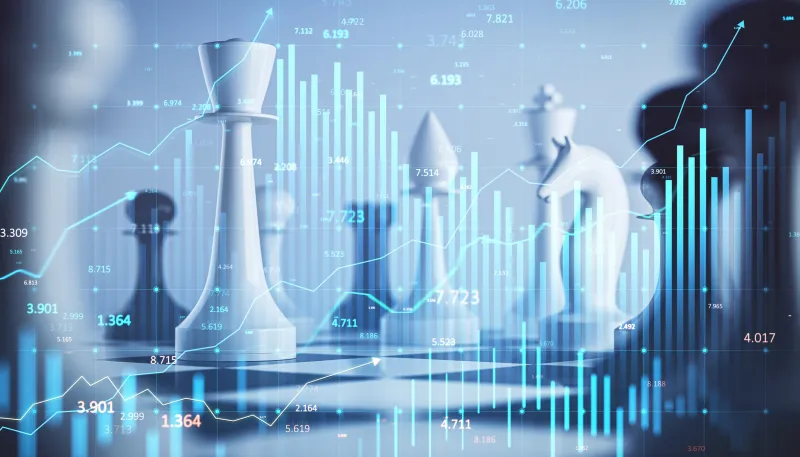 Chess pieces overlaying financial data graphs with blue digital light effects on a blurred background.