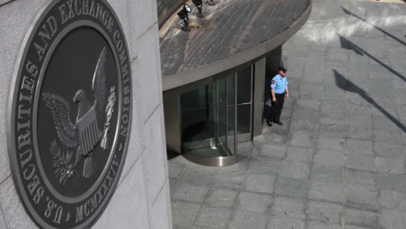 A security officer stands outside the U.S. Securities and Exchange Commission headquarters
